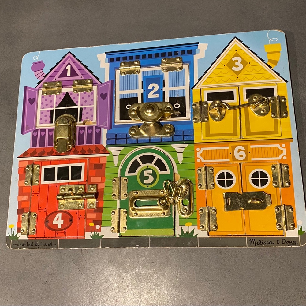 Melissa & Doug wooden latch development puzzle